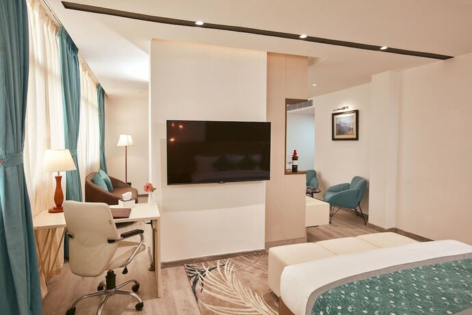 Imagen de la habitación del Hotel Indreni Suites. Foto 17