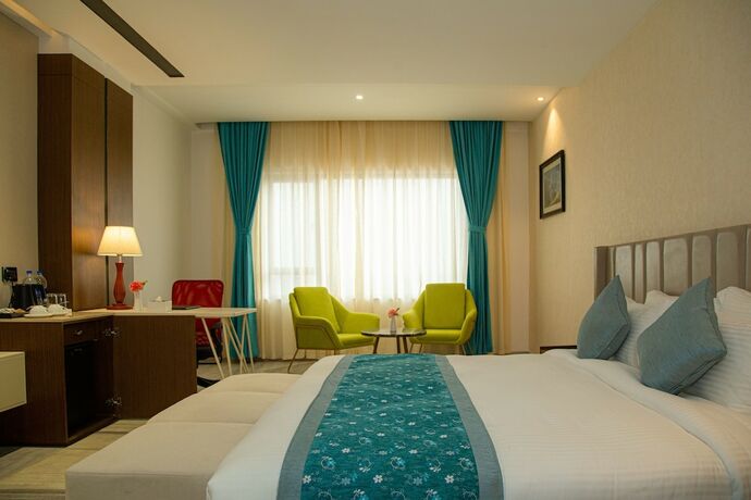 Imagen de la habitación del Hotel Indreni Suites. Foto 19