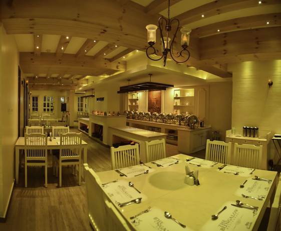 Imagen del bar/restaurante del Hotel Indriya Wayanad. Foto 4