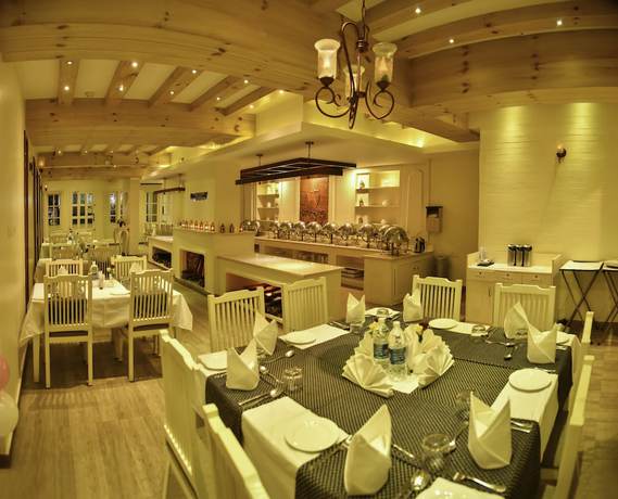 Imagen del bar/restaurante del Hotel Indriya Wayanad. Foto 8