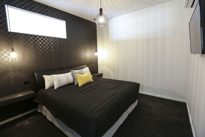 Imagen de la habitación del Hotel Indulge Apartments CBD. Foto 2