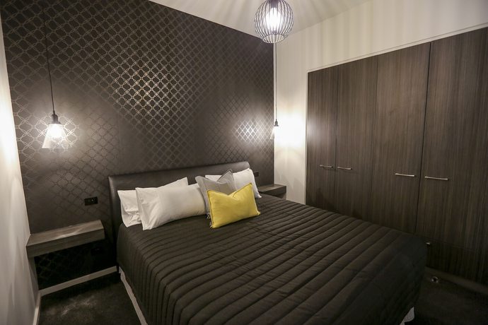 Imagen de la habitación del Hotel Indulge Apartments CBD. Foto 12