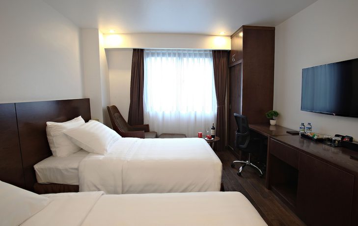 Imagen de la habitación del Hotel Inearth Hanoi. Foto 11
