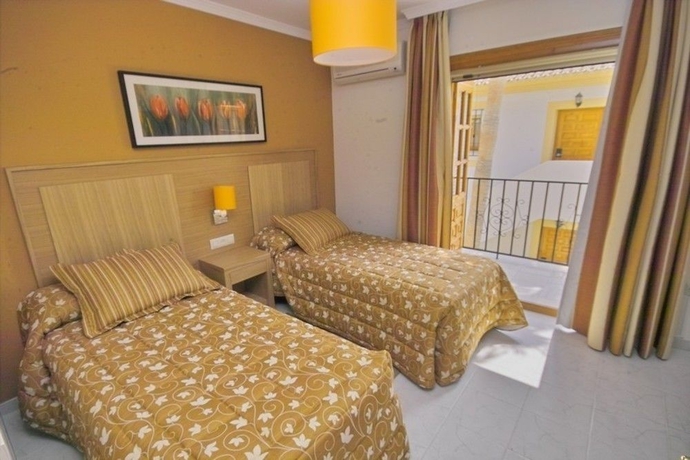 Imagen de la habitación del Hotel Infinity Bay Spa and Beach Resort. Foto 14