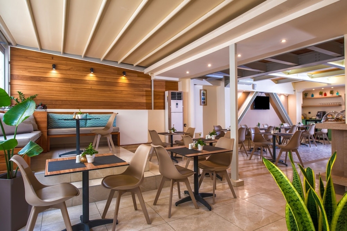 Imagen del bar/restaurante del Hotel Infinity City Boutique. Foto 2