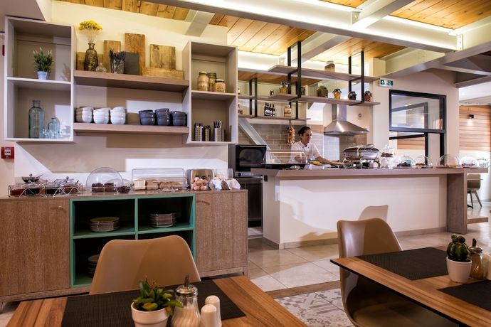 Imagen del bar/restaurante del Hotel Infinity City Boutique. Foto 4