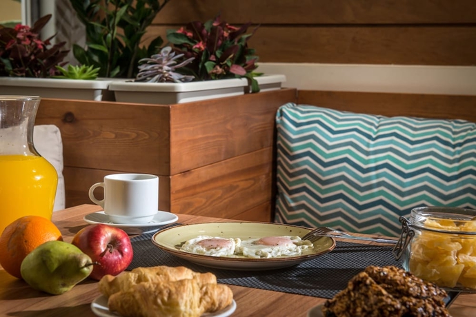 Imagen del bar/restaurante del Hotel Infinity City Boutique. Foto 6