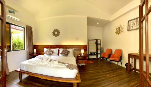 Imagen de la habitación del Hotel Infinity Diving Resort and Residences. Foto 19