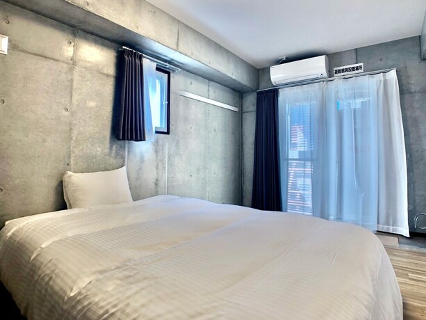 Imagen de la habitación del Hotel Infinity Nahakumoji. Foto 13