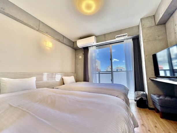 Imagen de la habitación del Hotel Infinity Nahakumoji. Foto 16