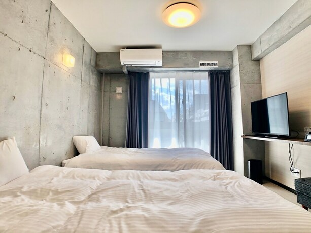 Imagen de la habitación del Hotel Infinity Nahakumoji. Foto 18