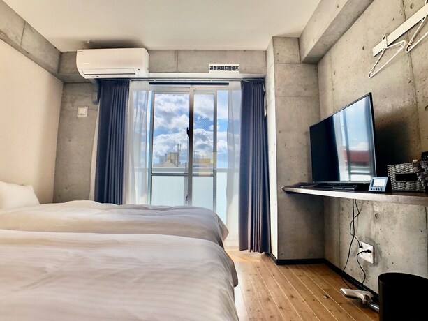 Imagen de la habitación del Hotel Infinity Nahakumoji. Foto 19