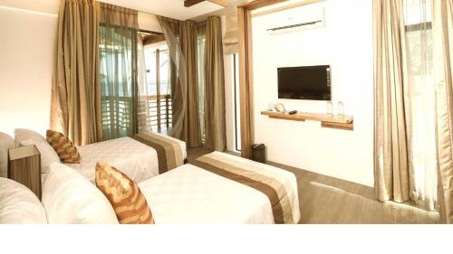 Imagen de la habitación del Hotel Infinity Resort. Foto 8