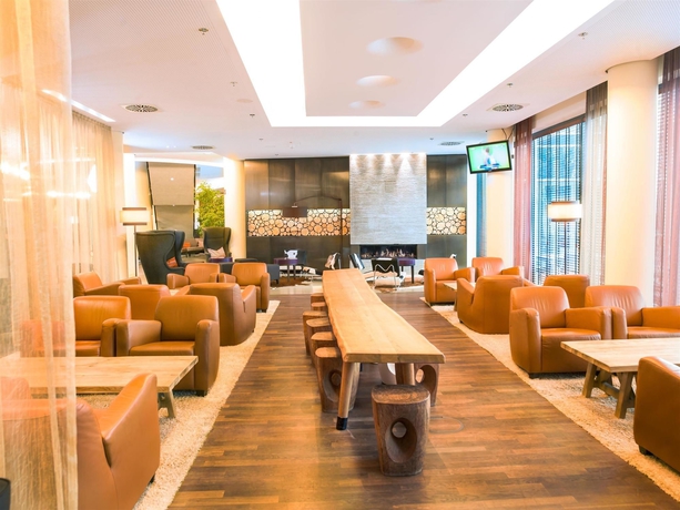 Imagen del bar/restaurante del Hotel Infinity and Conference Resort Munich. Foto 5