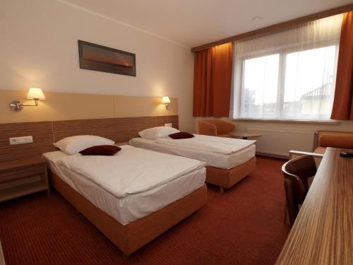 Imagen de la habitación del Hotel Info. Foto 7
