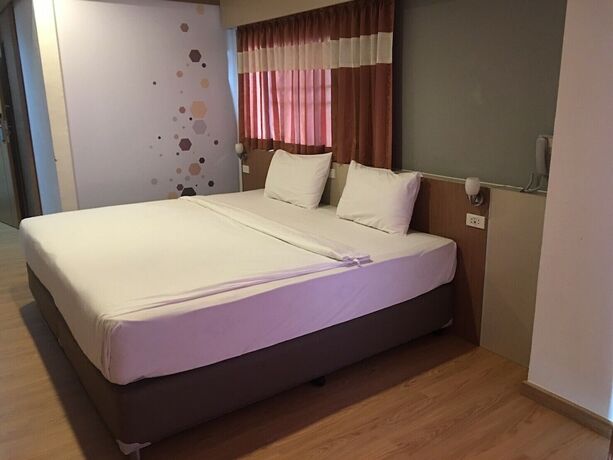 Imagen de la habitación del Hotel Ingnaam. Foto 13