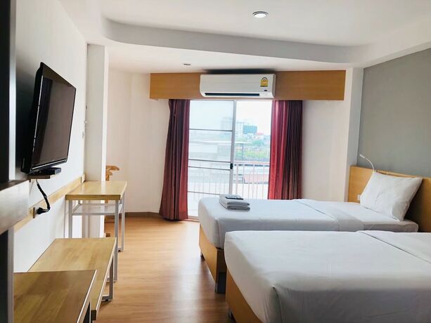 Imagen de la habitación del Hotel Ingnaam. Foto 14
