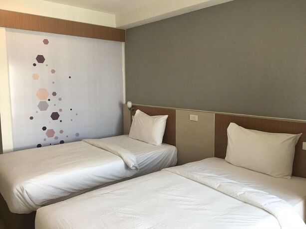Imagen de la habitación del Hotel Ingnaam. Foto 16
