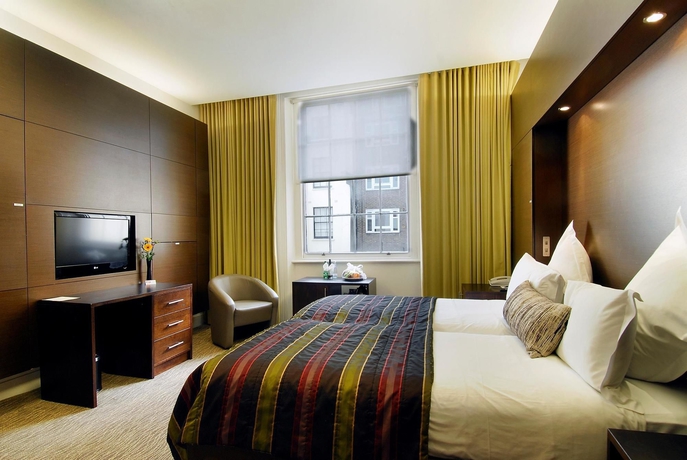 Imagen de la habitación del Hotel Inhabit Queens Garden. Foto 6