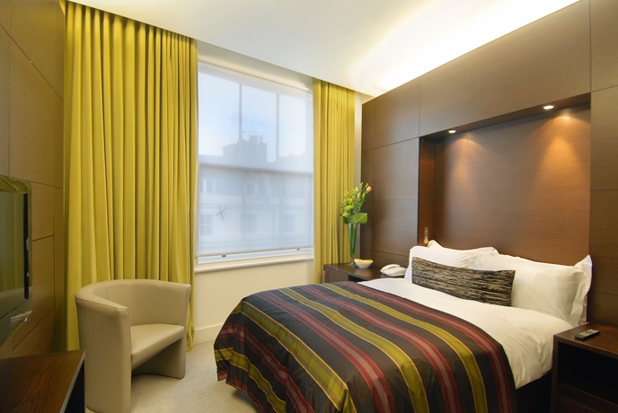 Imagen de la habitación del Hotel Inhabit Queens Garden. Foto 8