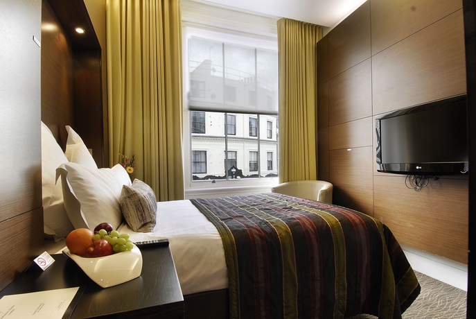 Imagen de la habitación del Hotel Inhabit Queens Garden. Foto 9