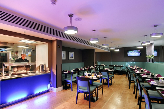 Imagen del bar/restaurante del Hotel Inhabit Queens Garden. Foto 2