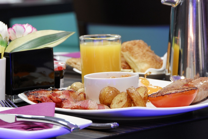 Imagen del bar/restaurante del Hotel Inhabit Queens Garden. Foto 3