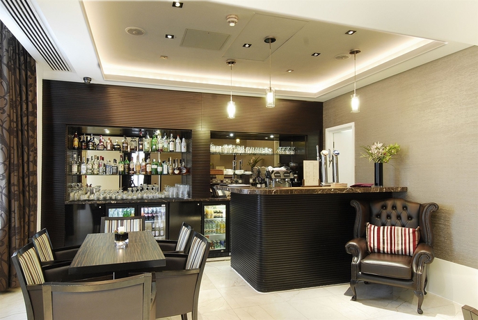 Imagen del bar/restaurante del Hotel Inhabit Queens Garden. Foto 5