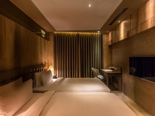 Imagen de la habitación del Hotel Inhouse Boutique. Foto 7