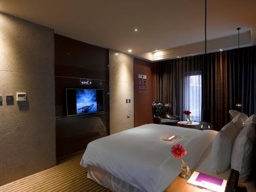 Imagen de la habitación del Hotel Inhouse Boutique. Foto 8