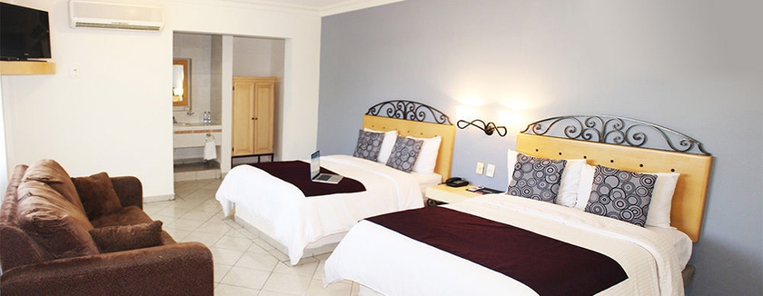 Imagen de la habitación del Hotel Inhouse Culiacán. Foto 7