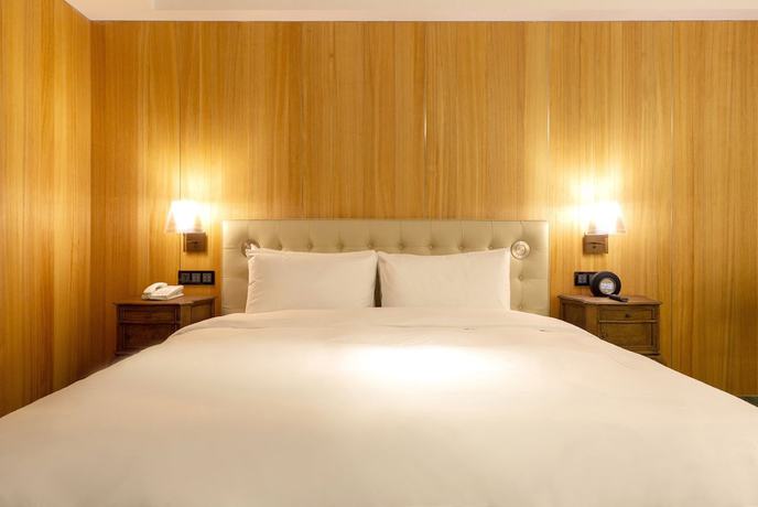 Imagen de la habitación del Hotel Inhouse Grand. Foto 4