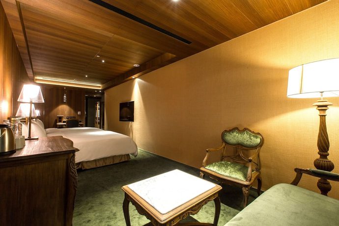 Imagen de la habitación del Hotel Inhouse Grand. Foto 6