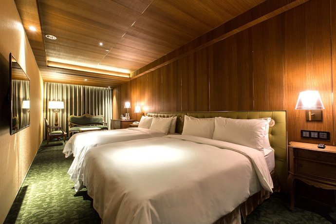 Imagen de la habitación del Hotel Inhouse Grand. Foto 8