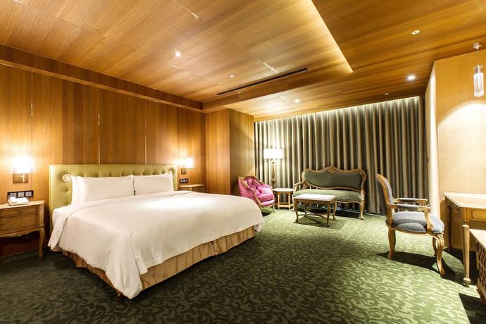 Imagen de la habitación del Hotel Inhouse Grand. Foto 9