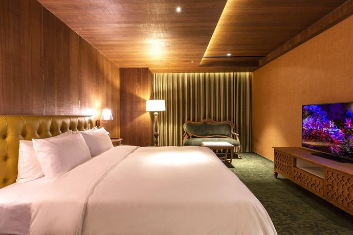 Imagen de la habitación del Hotel Inhouse Grand. Foto 10