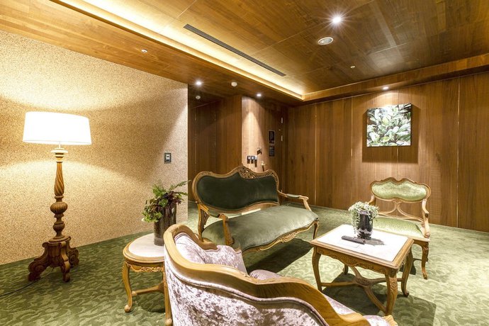 Imagen de la habitación del Hotel Inhouse Grand. Foto 11