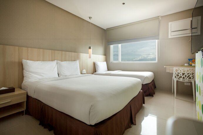 Imagen de la habitación del Hotel Injap Tower. Foto 18