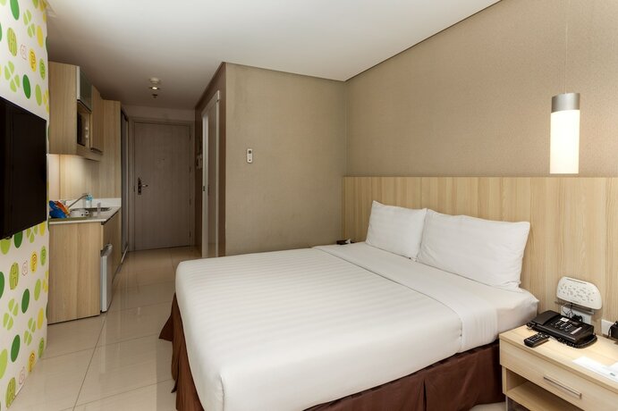 Imagen de la habitación del Hotel Injap Tower. Foto 19
