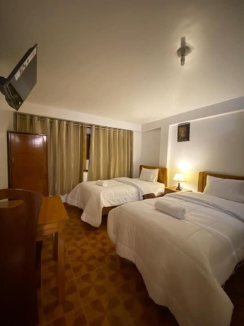 Imagen de la habitación del Hotel Inka House Inn. Foto 8