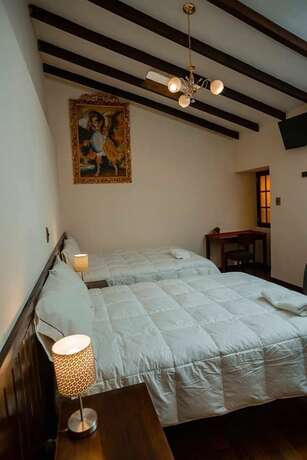 Imagen de la habitación del Hotel Inka Stone Boutique. Foto 13