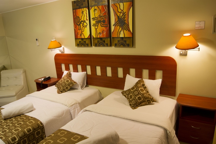 Imagen de la habitación del Hotel Inkari Suites. Foto 5