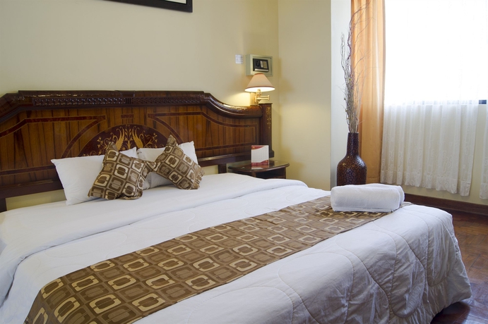 Imagen de la habitación del Hotel Inkari Suites. Foto 7