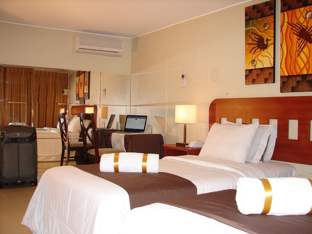 Imagen de la habitación del Hotel Inkari Suites. Foto 8