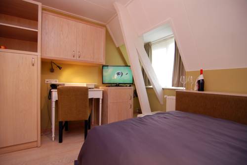 Imagen de la habitación del Hotel Inkelshoes. Foto 14