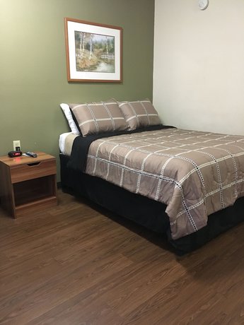 Imagen de la habitación del Hotel Inland Suites Lamar Street. Foto 4