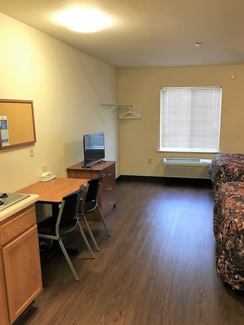Imagen de la habitación del Hotel Inland Suites Lamar Street. Foto 9