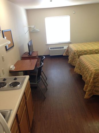 Imagen de la habitación del Hotel Inland Suites Lamar Street. Foto 10