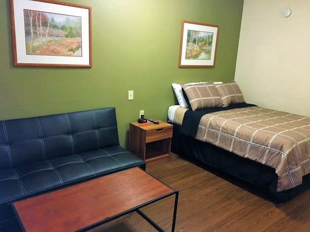 Imagen de la habitación del Hotel Inland Suites Lamar Street. Foto 11