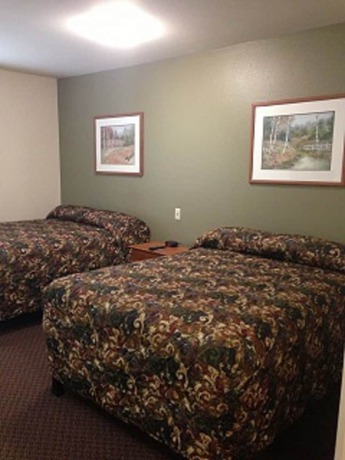Imagen de la habitación del Hotel Inland Suites Lamar Street. Foto 14